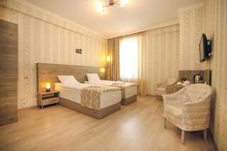 Отель Hotel Kenari Тбилиси Просторный двухместный номер с 2 отдельными кроватями-4
