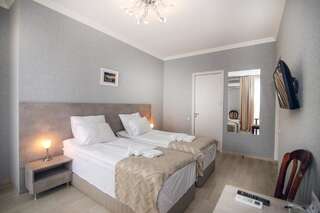 Отель Hotel Kenari Тбилиси Стандартный двухместный номер с 2 отдельными кроватями-5