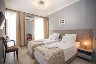 Отель Hotel Kenari Тбилиси Стандартный двухместный номер с 2 отдельными кроватями-6