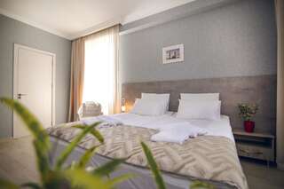 Отель Hotel Kenari Тбилиси Стандартный двухместный номер с 2 отдельными кроватями-1